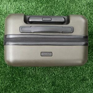 Calpak olive green mini carry on luggage